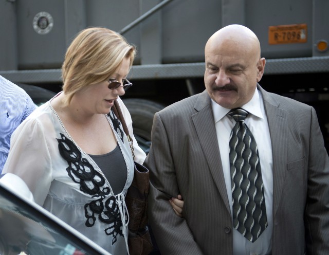 Anna Gristina the woman dubbed the'Manhattan Madam' arrives at court with a bodyguard in 2012. Gritina whose salacious prostitution case and rumored high-profile client list has gripped New York tabloids