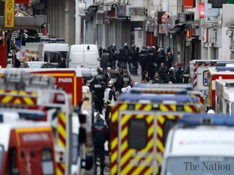 Gunfire erupts in Paris as police hunt suspected attack leader