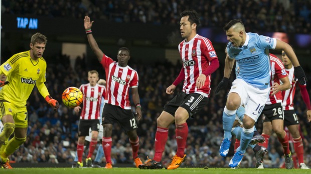 Oh the pain Manchester City's Sergio Aguero winces as he attempts to steer the ball past Southampton's goalkeeper Maarten Stekelenburg