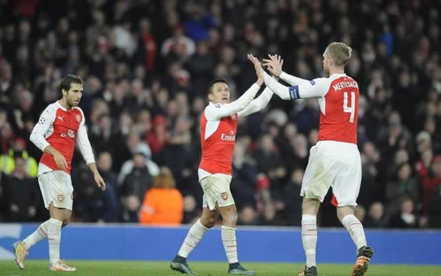 HIGH FIVE... Arsenal players Mathieu Flamini Alexis Sanchez and Per Mertesacker celebrate the third goal as the Gunners finished the evening in style against Zagreb at the Emirates on Tuesday. — Mailonline