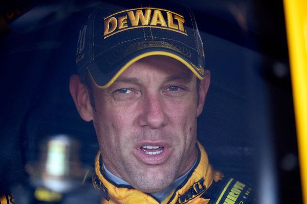 Sprint Cup Series driver Matt Kenseth waits in his car during practice for the