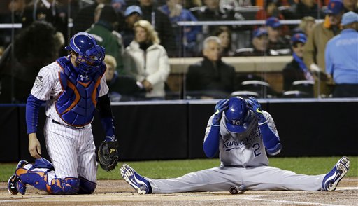 Kansas City Royals&#039 Alcides Escobar reacts after nearly hit by a pitch during the first inning of Game 3 of the Major League Baseball World Series against the New York Mets Friday Oct. 30 2015 in New York