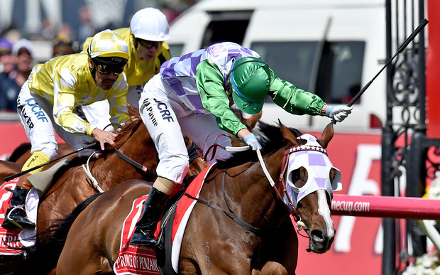 Jockey Michelle Payne riding Prince Of Penzance crosses the finish line to win the Melbourne Cup race at Flemington Racecourse in Melbourne on Tuesday Nov. 3 2015