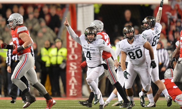 COLUMBUS OH- NOVEMBER 21 Michael Geiger #4 of the Michigan State Spartans celebrates after kicking a 41-yard field goal as time expired against the Ohio State Buckeyes at Ohio Stadium