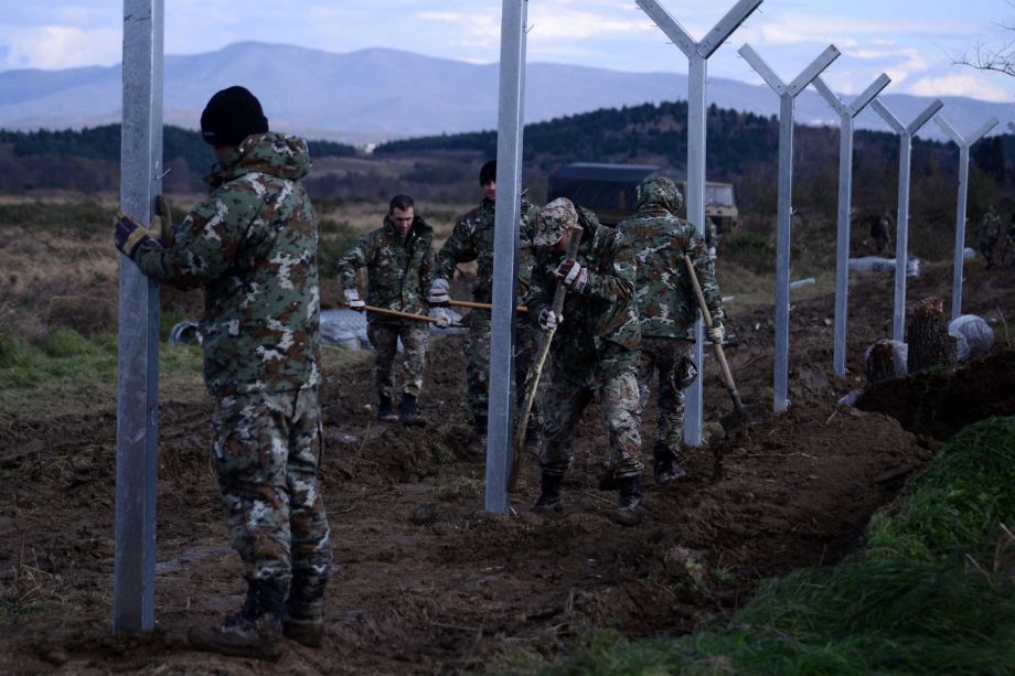 Macedonian army build a border fence to prevent illegal crossings by migrants in the Greek Macedonian border near the Greek village of Idomeni on Saturday Nov. 28 2015. Macedonia toughened rules for crossings earlier this month in the wake of the dead