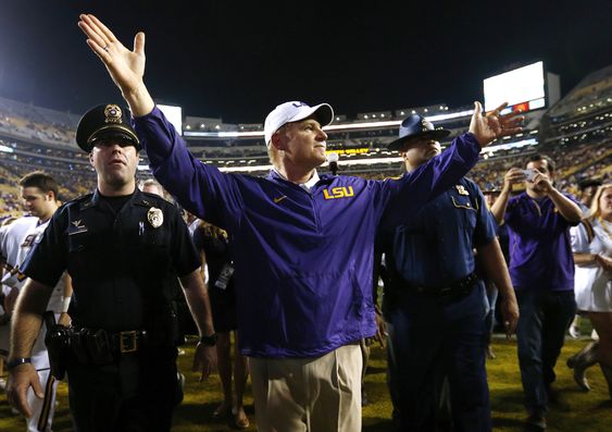 Les Miles celebrates after an NCAA college football game against Texas A&M in Baton Rouge La. Saturday Nov. 28 2015. LSU won 19-7