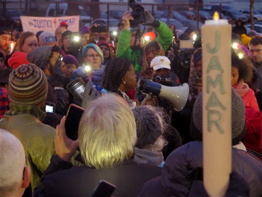 Minneapolis NAACP leader Nekima Levy Pounds speaks at a Nov. 20 prayer vigil n Minneapolis. AP