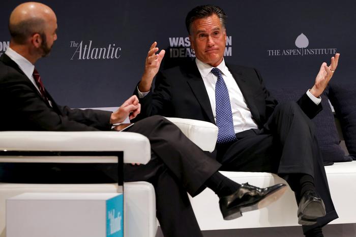 Former Massachusetts Governor Mitt Romney takes part in an onstage interview with The Atlantic Editor-in-chief James Bennet at the Washington Ideas Forum in Washington