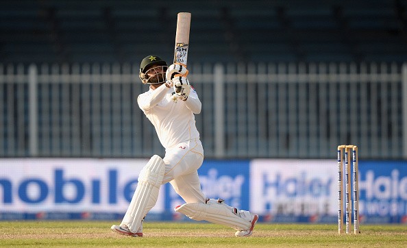 Mohammad Hafeez of Pakistan hits James Anderson of England for six runs during day three of the 3rd Test