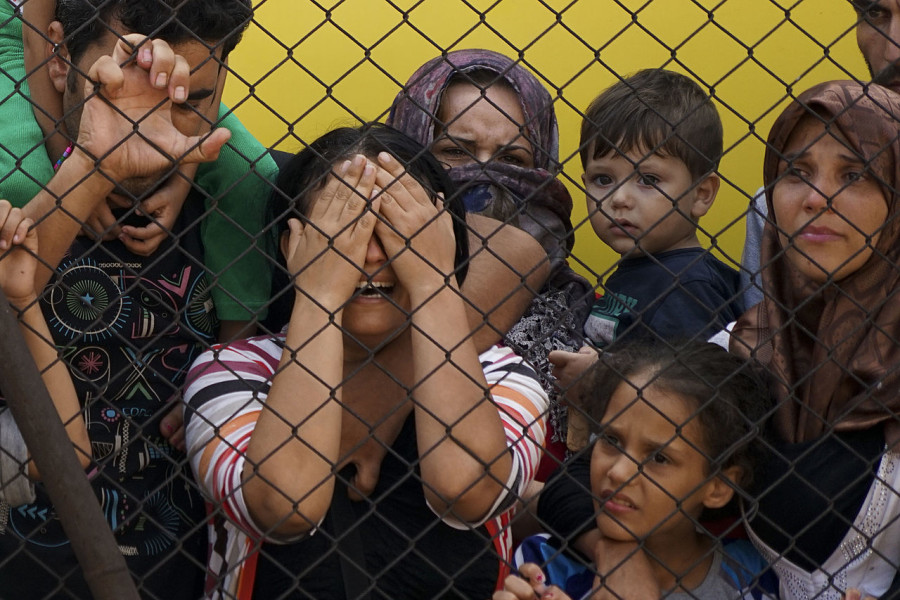 Mstyslav Chernov Syrian refugees wait at the platform of the Budapest Keleti railway station