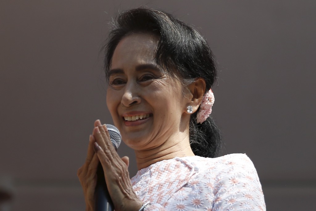 Myanmar's National League for Democracy party leader Aung San Suu Kyi talks to supporters after general elections in Yangon Myanmar on Nov. 9