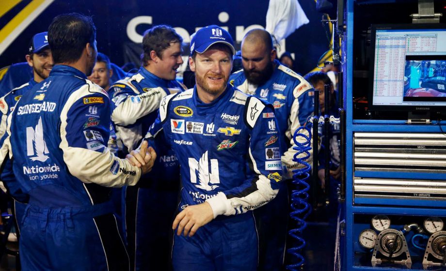 Dale Earnhardt Jr. gets congratulations after winning the rain-shortened NASCAR Sprint Cup series auto race Sunday Nov. 15 2015 in Avondale Ariz