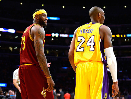 LOS ANGELES CA- JANUARY 15 Le Bron James #23 of the Cleveland Cavaliers laughs with Kobe Bryant #24 of the Los Angeles Lakers during a 109-102 Cavalier win at Staples Center