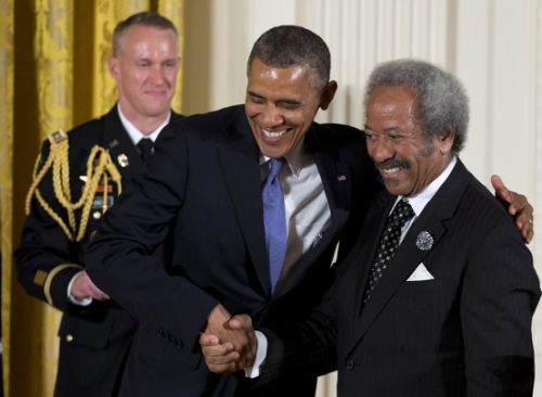 10 2013 US President Barack Obama welcomes Allen Toussaint to award him the 2012 National Medal of Arts for his contributions as a composer producer and performer during a ceremony in the East Room of Wh