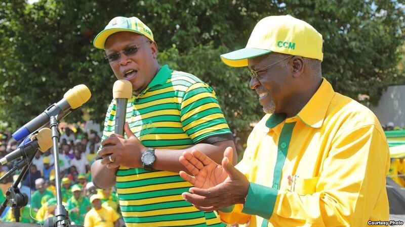 Nape Nnauye spokesman for the ruling Chama Cha Mapinduzi party speaks alongside President-elect John Magufuli