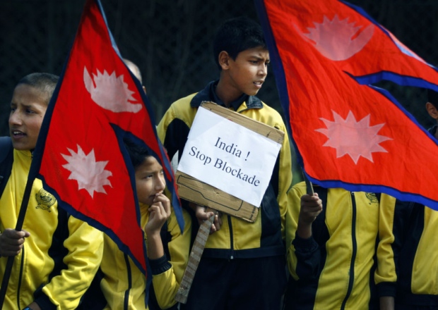 Pupils take part in a protest on the outskirts of Kathmandu