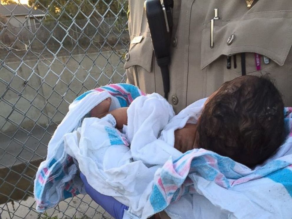 Los Angeles officials report a baby hours old was found buried alive