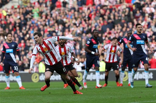 Sunderland's Adam Johnson celebrates his goal during their English Premier League soccer match between Sunderland and Newcastle United at the Stadium of Light Sunderland England Sunday Oct. 25 2015