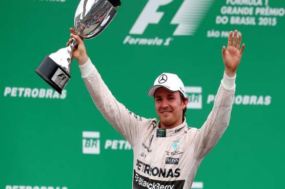 Nico Rosberg edged his Mercedes team-mate Lewis Hamilton to win the Brazilian Grand Prix title