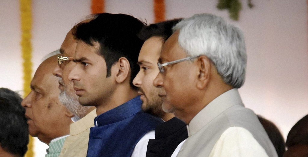 Bihar chief minister Nitish Kumar with deputy chief minister Tejashwi Yadav. Health Minister Tej Pratap Yadav and Finance Minister Abdul Bari during the swearing-in ceremony at Gandhi Maidan in Patna on Friday. Credit PTI