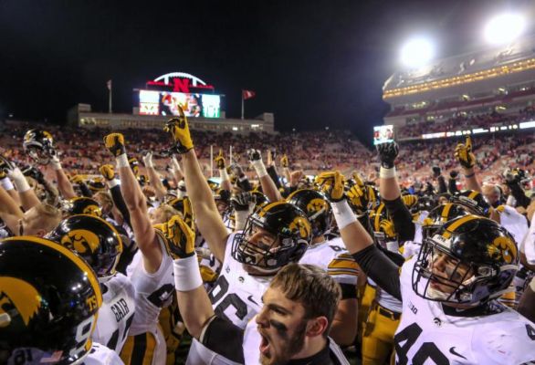 Iowa players celebrate their 28-20 win over Nebraska