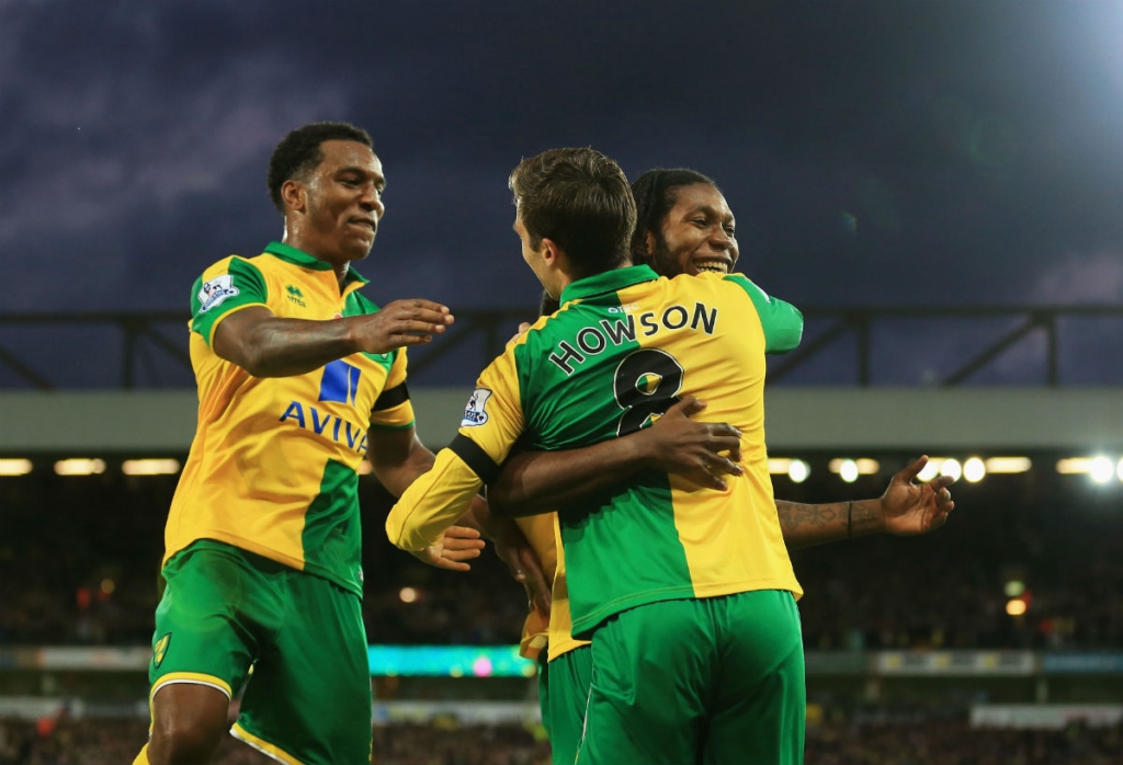 Norwich City players celebrate Jonathan Howson's goal against Swansea City