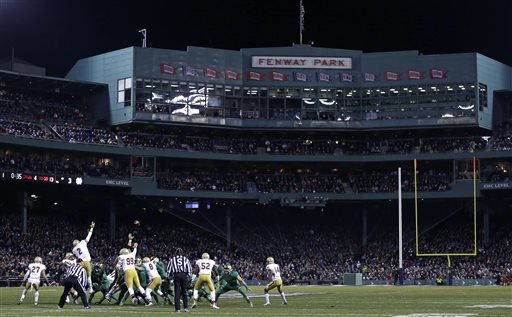 Boston College tries to block a field goal-attempt which was unsuccessful after hitting one of the uprights during the first half of the Shamrock Series NCAA college football game at Fenway Park home of the Boston Red Sox in Boston Saturday Nov. 21