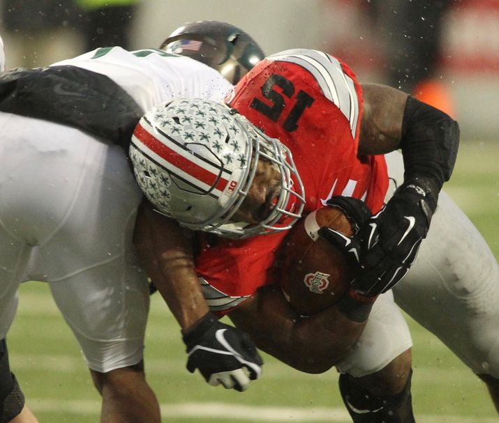 Ohio State’s Ezekiel Elliott carries the ball against Michigan State on Saturday Nov. 21 2015 at Ohio Stadium in Columbus. David Jablonski Staff