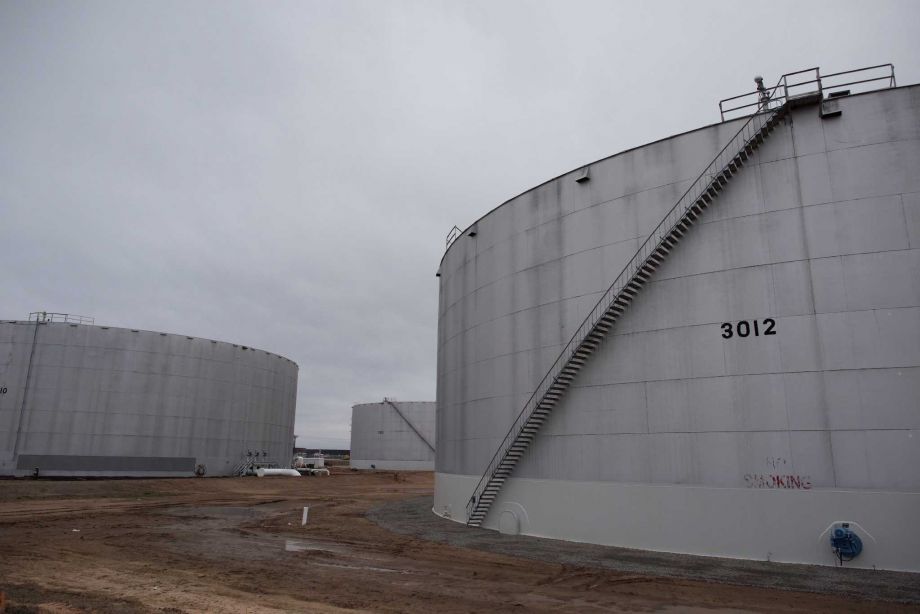 Oil storage tanks stand at the Enbridge Inc. Cushing storage terminal in Cushing Oklahoma. OPEC said in its monthly oil report that crude and petroleum product stocks in developed economies have surged past levels they reached almost seven years ago as