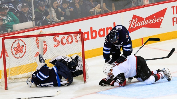 Ondrej Pavelec goes down injured