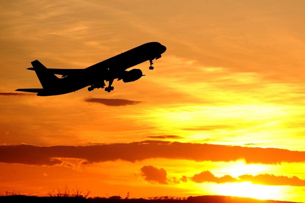 A plane leaving Newcastle Airport