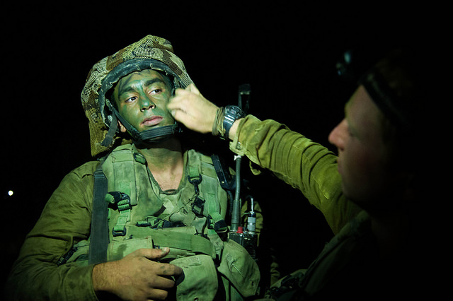 An Israeli soldier prepares for a night attack inside Gaza as part of Operation Protective Edge which killed more than 2,000 Gazans in 2014