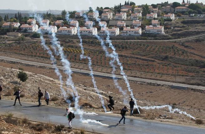 Palestinian rams car into Israeli officer, then is shot dead