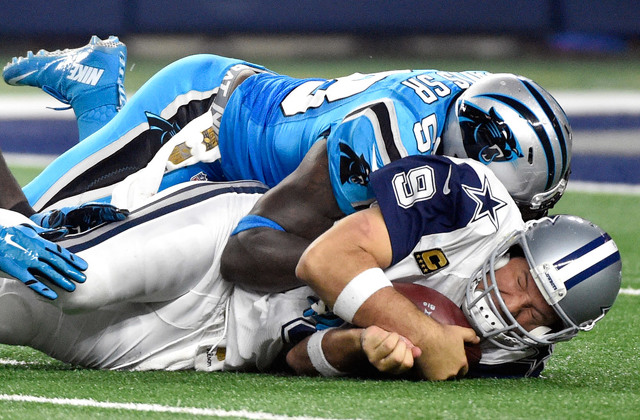 Panthers linebacker Thomas Davis sacked Cowboys quarterback Tony Romo and knocked him out of the game. Click