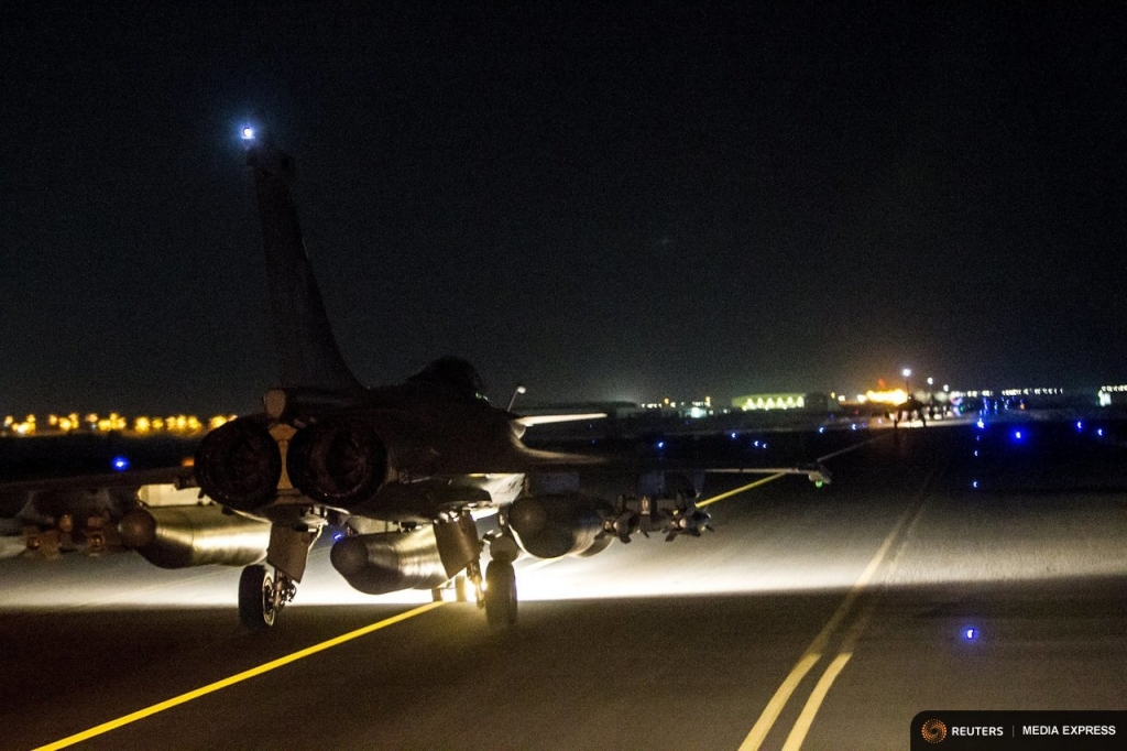 A French fighter jet taxis along the runway in an undisclosed location in this handout