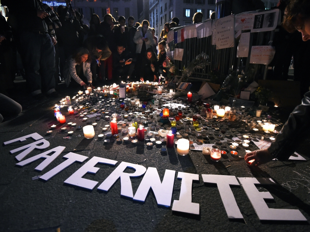 People light candles in Marseille as they pay tribute to the victims of the attacks in Nov. 13 Paris.    Anne Christine Poujoulat    
  AFP  Getty Images