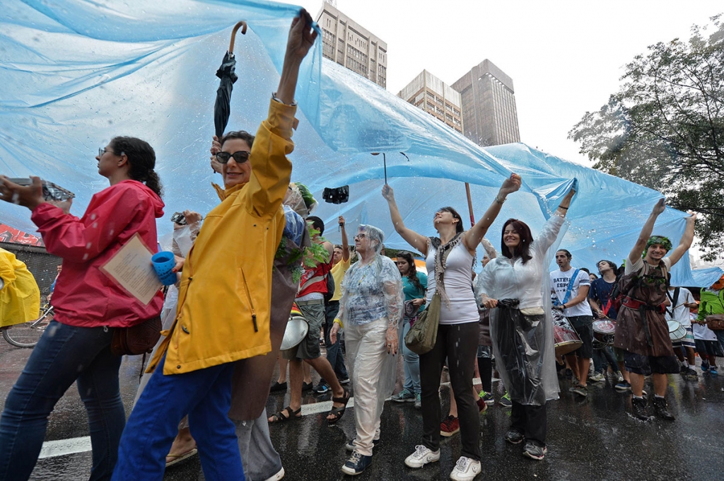 People take part in the Global Climate March in Sao Paulo Brazil on November 29. AFP