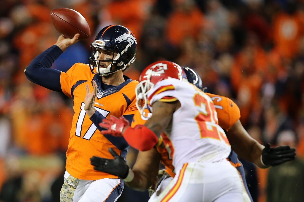 DENVER CO- NOVEMBER 15 Quarterback Brock Osweiler #17 of the Denver Broncos delivers a pass against the Kansas City Chiefs at Sports Authority Field at Mile High