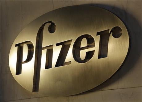 The Pfizer logo is displayed at world headquarters Monday Nov. 23 2015 in New York. Pfizer and Allergan will join in a $160 billion deal to create the world's largest drugmaker