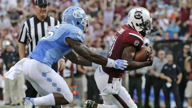 Pharoh Cooper right scoring a touchdown against North Carolina