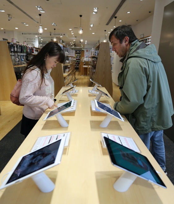 Customers shopping at Apple store