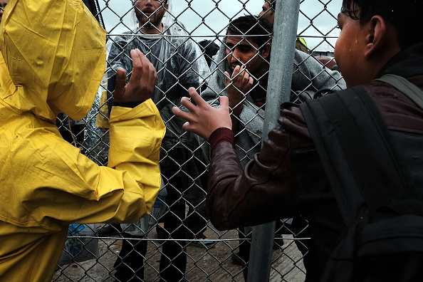 Iranian refugees sew mouths to protest Greek Macedonian border control