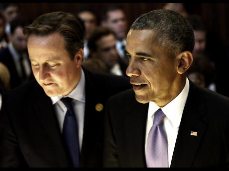 Video AP US President Barack Obama walks with British Prime Minister David Cameron at the G-20 summit in Antalya Turk