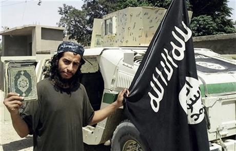 This undated image made available in the Islamic State's English-language magazine Dabiq shows Belgian Abdelhamid Abaaoud.. Abaaoud the Belgian jihadi suspected of masterminding deadly attacks in Paris was killed in a police raid on a suburban apartment