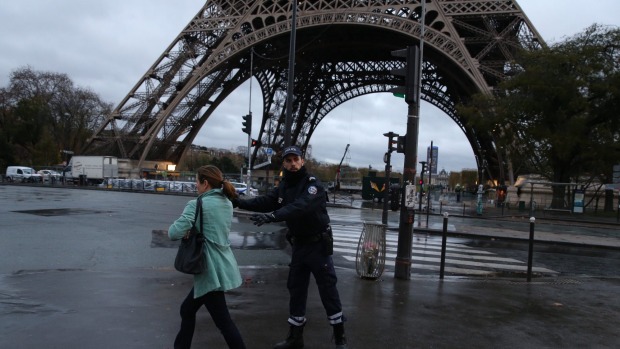 Police clear the Eiffel Tower in Paris on Tuesday