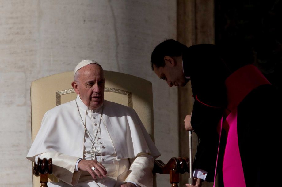 Pope Francis sits during his weekly general audience in St. Peter's Square at the Vatican Wednesday Nov. 4 2015