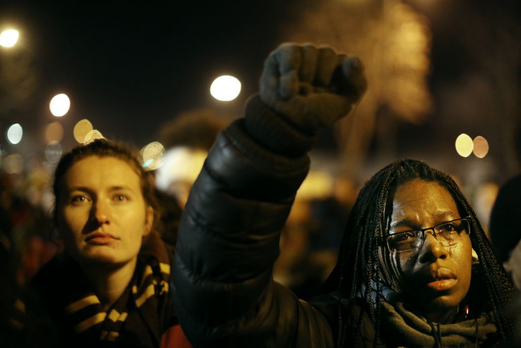 Tears flowed from the eyes of British Holloman as she listened to the Sam Cooke song'A Change Is Gonna Come during a concert in front of the Fourth Precinct station on Tuesday in Minneapolis