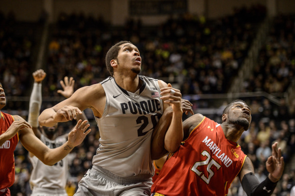 Purdue's A.J. Hammons fights for a rebound last season against Maryland. He did not play in the opener Friday night