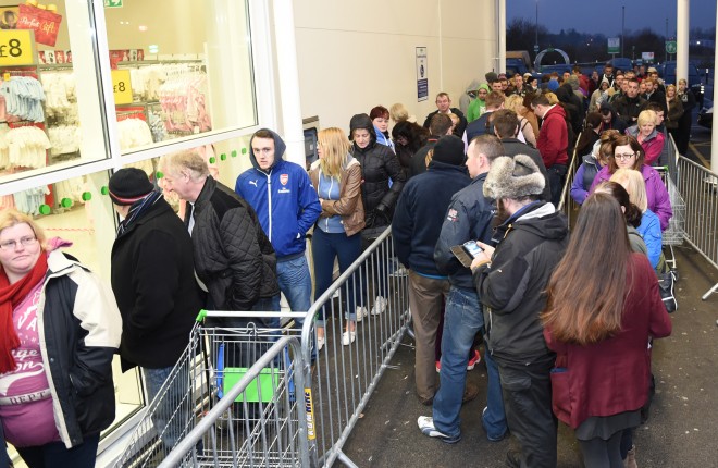 QUEUE.. Crowds flocked to Asda in their hundreds to pick up a bargain at the Black Friday sales. RMGFH73