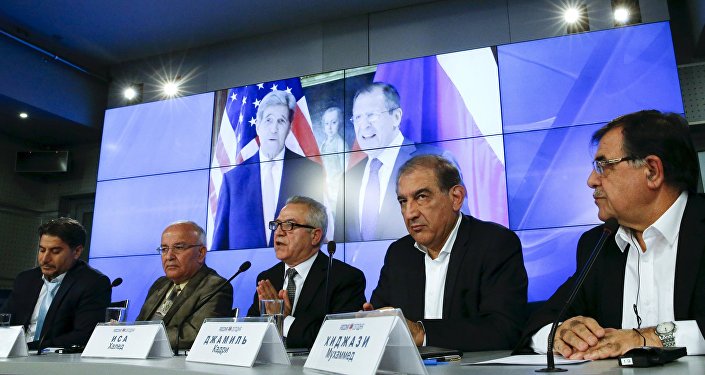 Syrian opposition members attend a news conference ahead of new round of crisis talks in Vienna on Saturday in Moscow